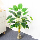 Artificial tropical banana tree with decorative palm leaves