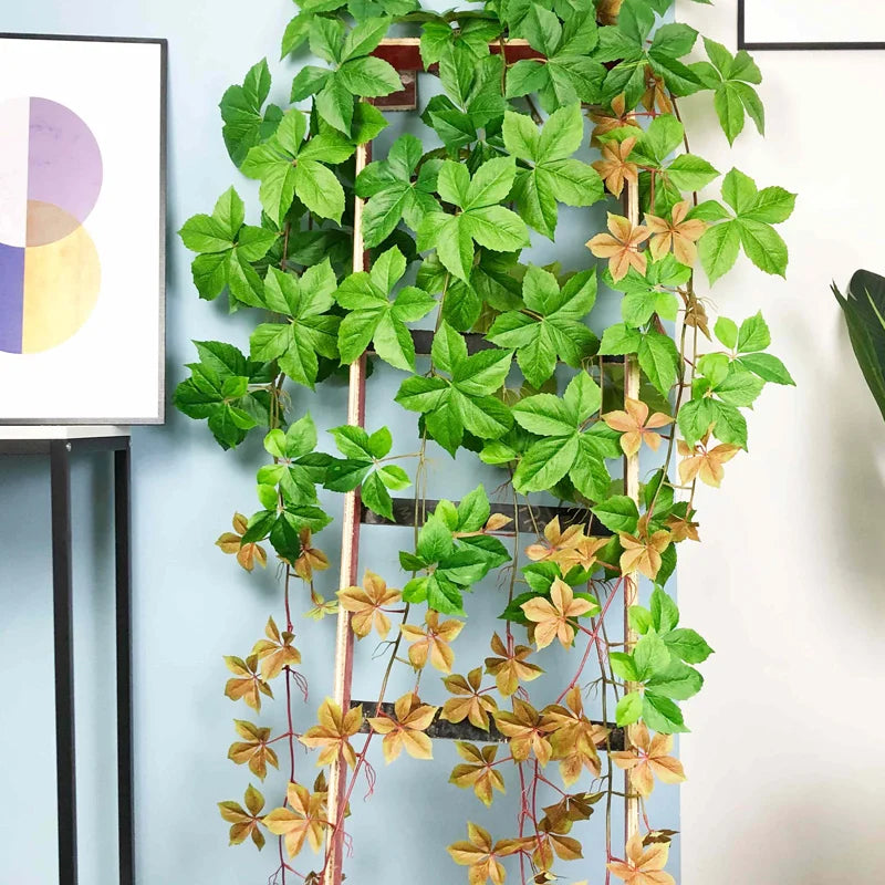 Tropical artificial hanging plants with large green leaves