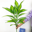Decorative artificial tropical palm branches plastic