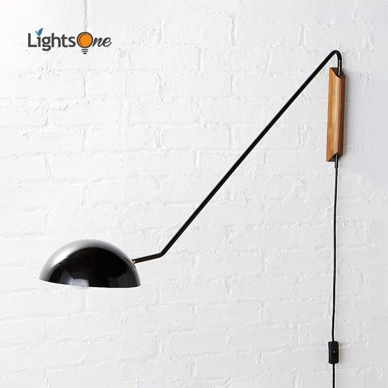 Minimalist rotating wall light
