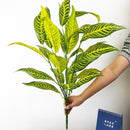 Artificial monstera plant with decorative tropical leaves for indoor garden