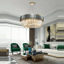 Elegant and modern art deco chandelier in stainless steel and crystal