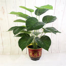 Artificial tropical monstera plant for indoor decoration