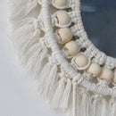 Boho-style macramé wall mirror for interior decoration