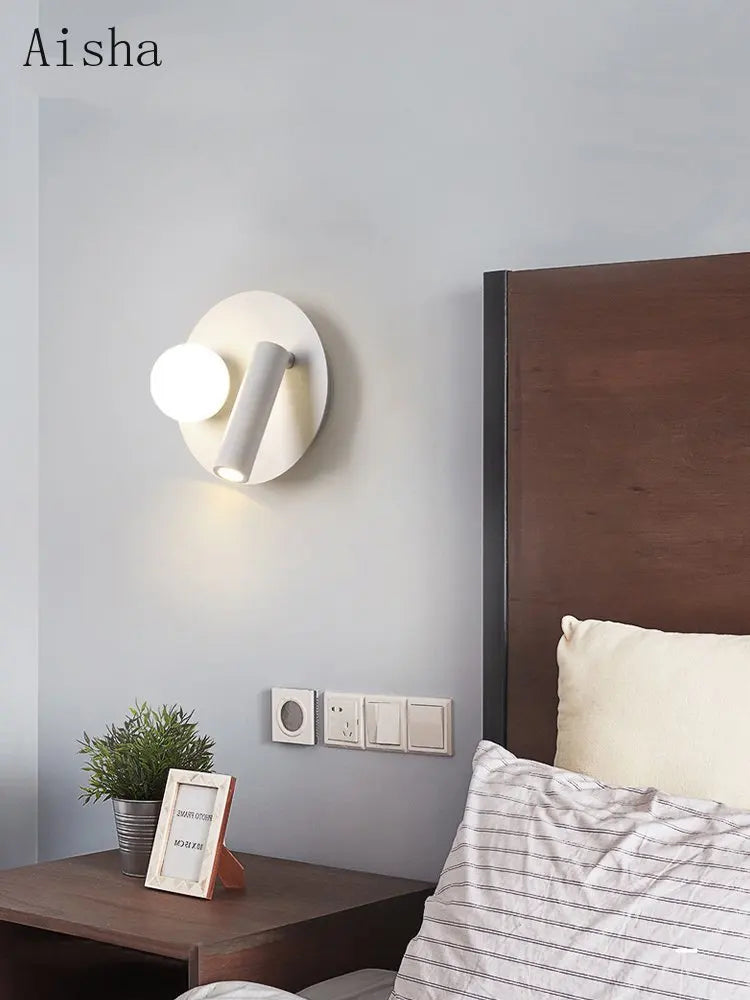 Modern rotating LED wall light for decorative interiors
