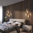 modern rotating LED wall light with three dimmed lights