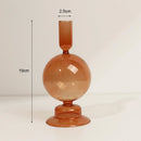 Glass candle holders for festive table decoration