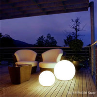 Modern LED globe floor lamp for indoor and outdoor decor