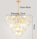 Round gold steel chandelier with crystal and interior LED lighting