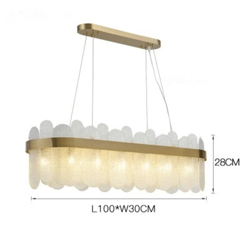 Oval gold metal chandelier with suspended glass shade