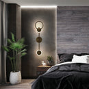 modern rotating LED wall light with three dimmed lights