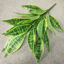 Decorative artificial tropical palm branches plastic