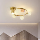 designer ceiling light in black and gold metal with white ball for modern interiors