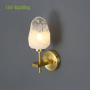 Designer glass and gold copper wall light for interiors