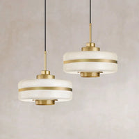 Modern gold metal pendant light with industrial design for interiors