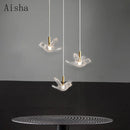 Modern bird pendant light in copper and acrylic