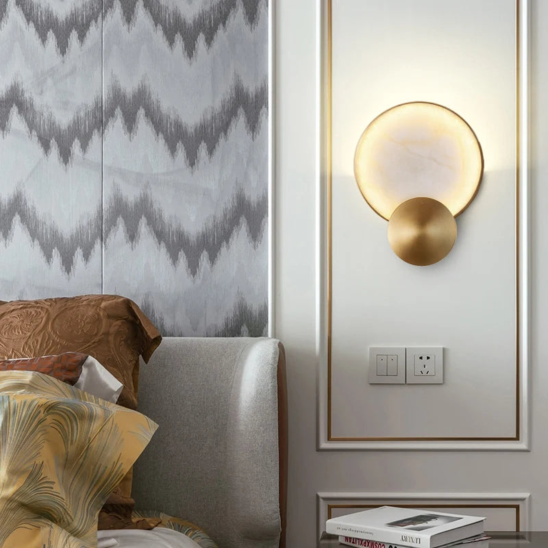 Modern marble wall light with gold finish