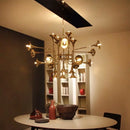 Modern gold horn pendant light for musical lighting
