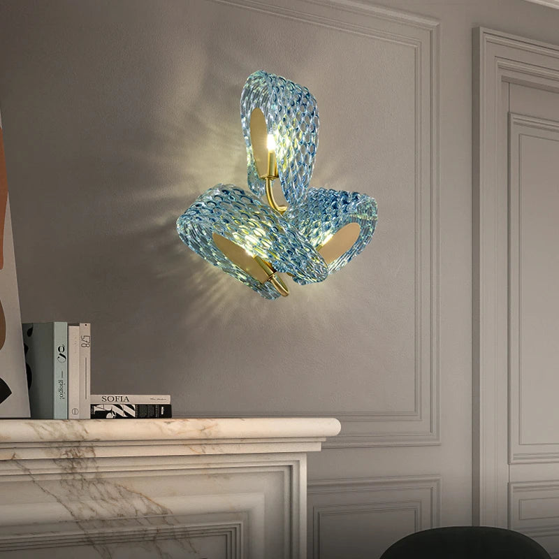 Modern glass wall light with gold and copper design