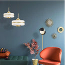 Modern gold metal pendant light with industrial design for interiors