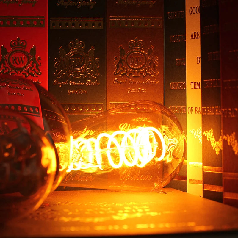 Retro LED Edison bulb with warm yellow vintage filament light