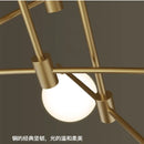 Gold chandelier with glass globe for indoor lighting