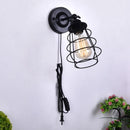 Iron bedside lamp with vintage bulb and switch