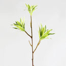 Large artificial bamboo branch with decorative flowers and leaves