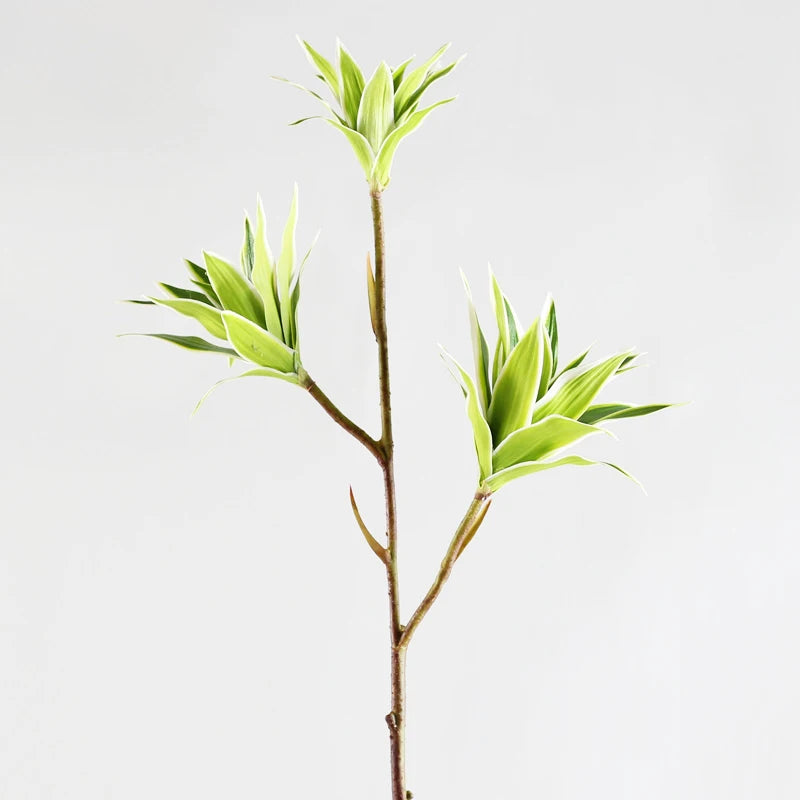 Large artificial bamboo branch with decorative flowers and leaves