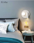Modern rotating LED wall light for decorative interiors