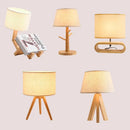 Modern wooden table lamp with decorative fabric shade