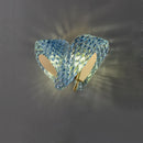 Art deco copper and blue glass wall light with elegant design
