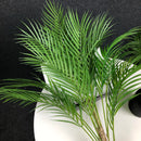 Artificial palm bouquet for festive Hawaiian decoration
