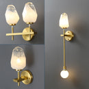 Designer glass and gold copper wall light for interiors