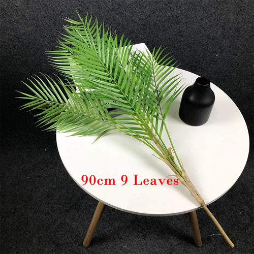 Artificial tropical palm tree with monstera leaves garden decoration - vue 13 sur 12