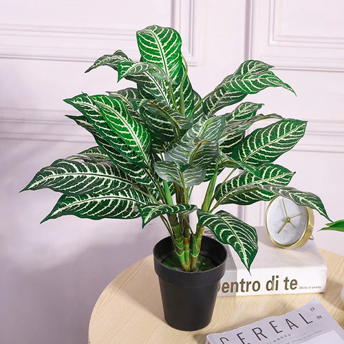 Tropical artificial monstera plant bouquet for interior decoration