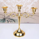 Retro metal three-arm candle holder for events and decorations