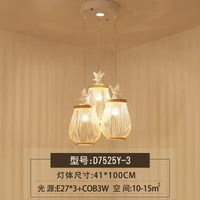 Modern wood and bamboo pendant light with decorative bird design