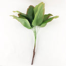 Large artificial monstera and banana plants for indoor decoration
