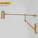 Retractable LED wall light with folding arm
