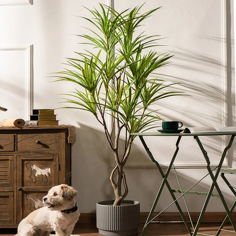 Large artificial palm tree tropical plant in decorative pot