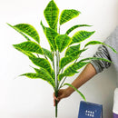 Artificial monstera plant with decorative tropical leaves for indoor garden