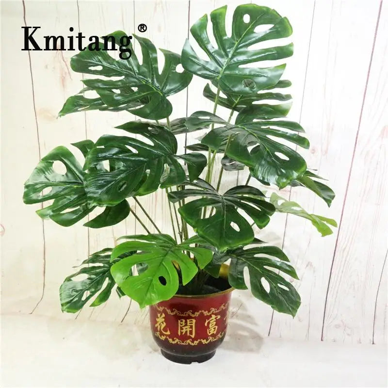 Artificial tropical monstera plant for indoor decoration