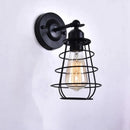 Iron bedside lamp with vintage bulb and switch