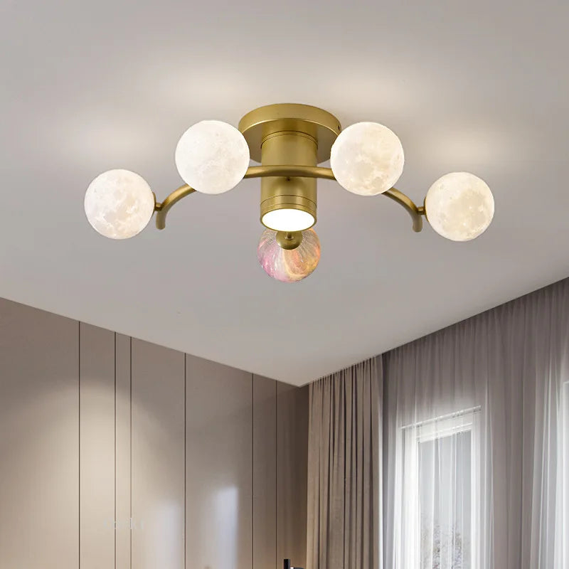 designer ceiling light in black and gold metal with white ball for modern interiors - vue 3 sur 18