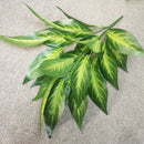 Decorative artificial tropical palm branches plastic