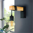 Modern decorative iron and wood wall light for interiors