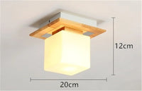 Japanese glass and wood ceiling light for modern interiors
