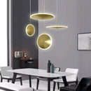 Round gold metal pendant light with ufo design