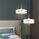 Modern gold metal pendant light with industrial design for interiors